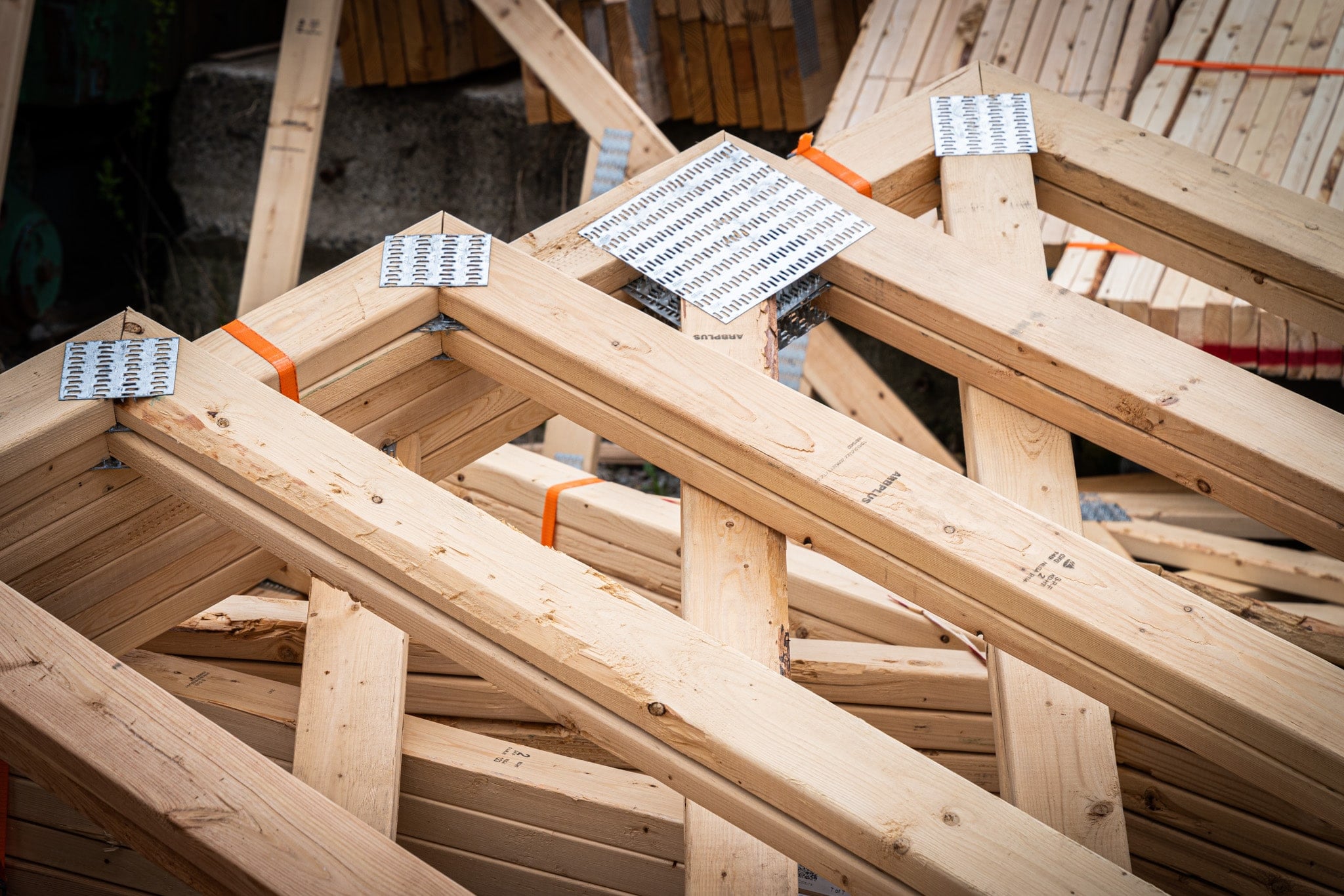Engineered roof trusses framed on a large residential structure