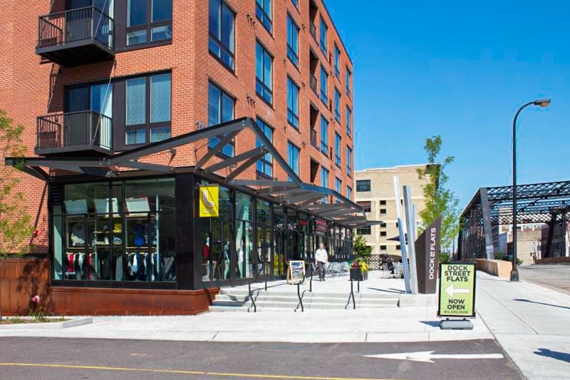 Aluminum sunshade and canopy systems on a building facade