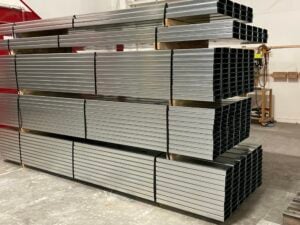 Cold formed steel studs and fabricated components bundled for delivery