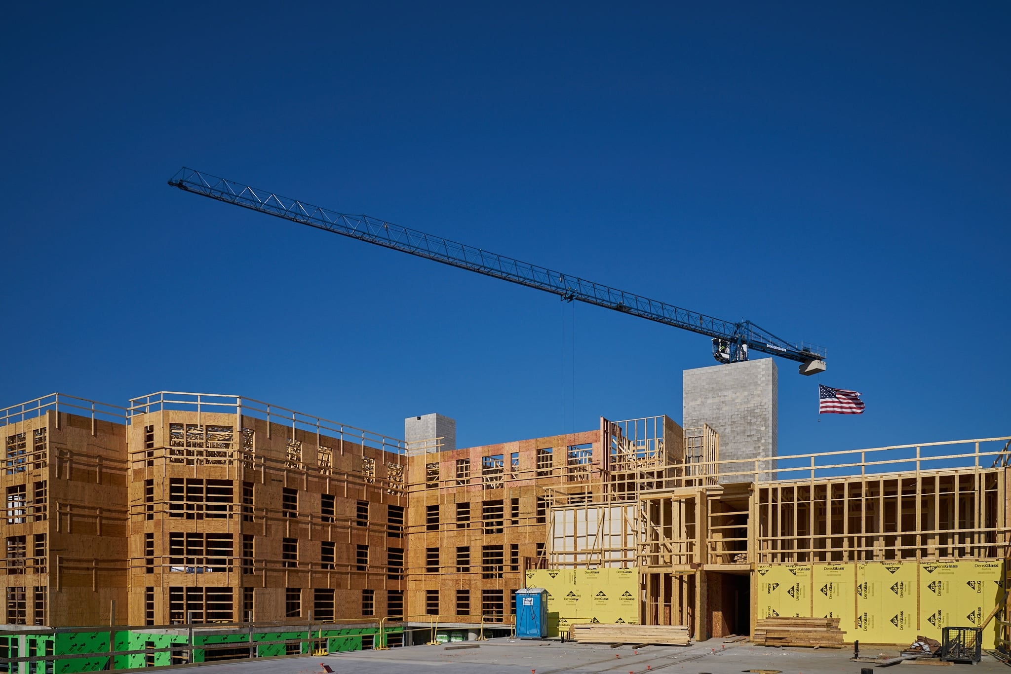 Shawnlee Construction multistory wood framing with crane